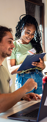 Two people collaborating on a community project