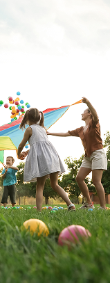 Children playing with a kite outdoors
